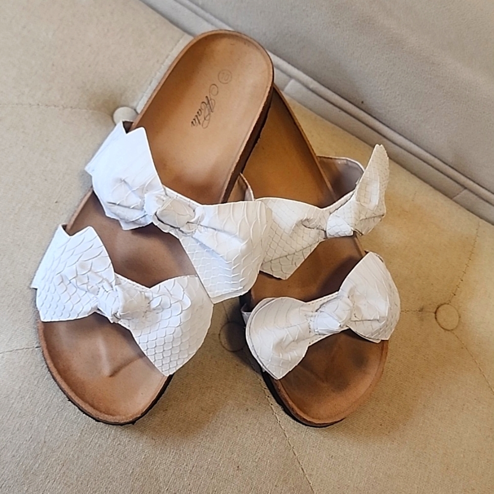 White snake skin sandal.